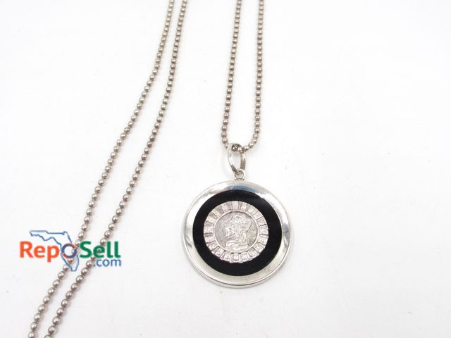 Lot 31-6008 - .925 Silver Aztec pendant with 24-inch chain - 15.88 gt