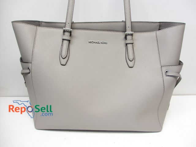 Lot 31-1494 - Michael Kors Purse with Tags - Please Inspect (strap has loose edging)