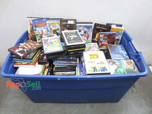 Lot 31-1203 - Large Tote of DVDs: Green Mile, Moana, Sweeny Todd, Trolls, etc.