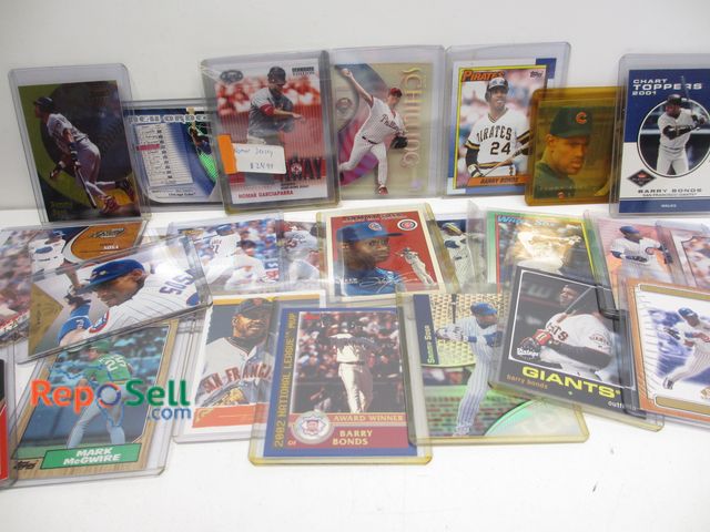 Lot 31-6022 - (27) Baseball Cards in Sleeves: Nomar jersey, (5) Barry Bonds, (17) Sosa, McGwire, etc.