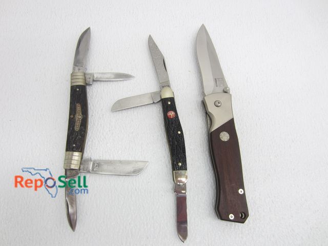 Lot 31-9069 - (3) Baker Solinger Pocket Knives 440C, 5474 etc