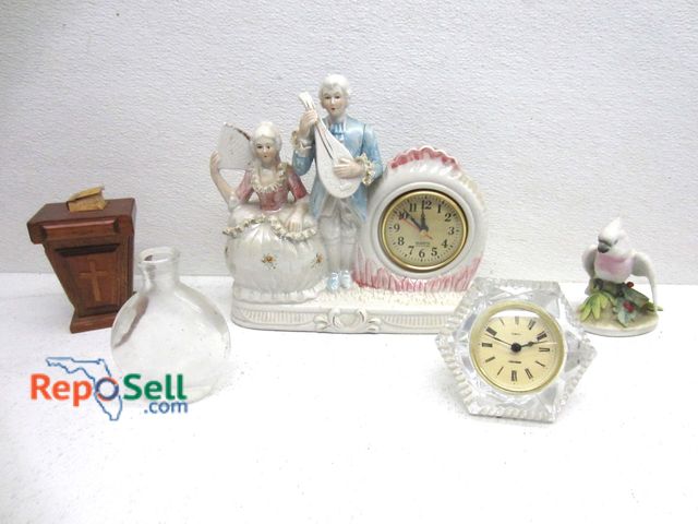 Lot 31-9166 - Estate Lot: Ceramic Clock, Lectern Music Box (Working), Parrot etc