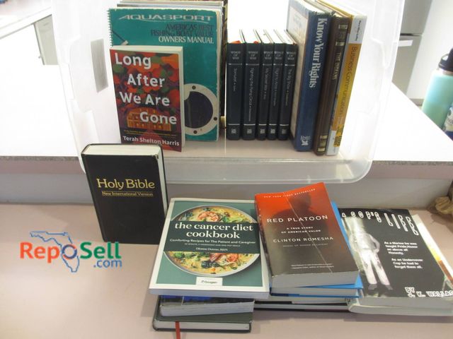 Lot 31-8558 - Books Including Holy Bible, Manuals, Nonfiction Titles And Tote