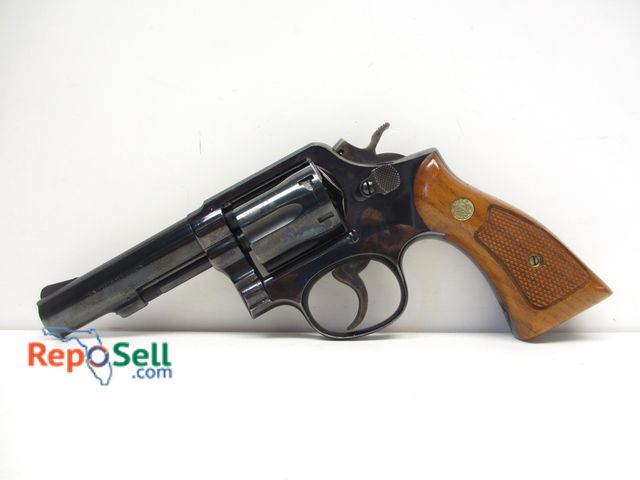 Lot 31-1049 - Smith and Wesson Model 10-6 .38 S&amp;W Revolver with 4" Barrel, soft case, serial D2127xx