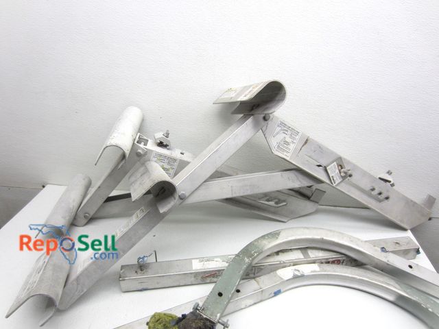 Lot 31-9100 - (2) Werner Ladder Jacks And Brace