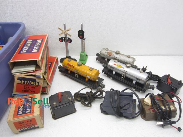 Lot 31-6120 - Lot of Lionel Trains &amp; Transformers: 5- Boxes, Sunoco, Oil Car, Shell