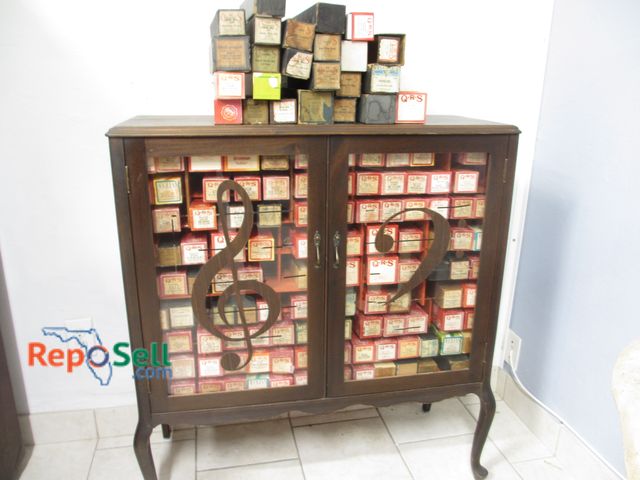 Lot 31-1172 - Wood and Glass Cabinet w/ Approximately 150 Player Piano Rolls; 36" x 40"