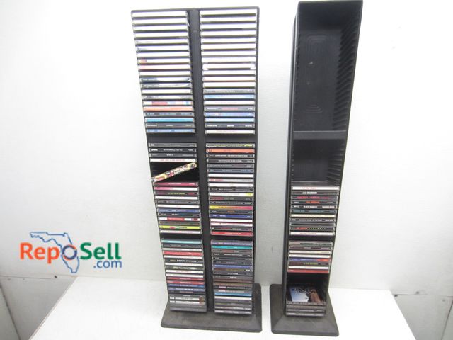 Lot 31-6194 - Approx (140) CD's With (2) Racks: Chicago, The Who, TLC, Lynyrd Skynyrd etc