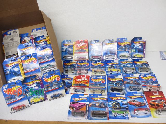 Lot 31-1059 - Approx. (70) Hot Wheels Diecast; ALL NEW MOC; Includes American Muscle Cars, Redlines, Special Paint...