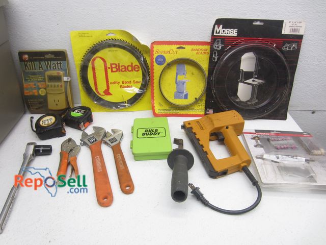 Lot 31-9463 - Tool Lot: Band Saw Blades, Wrenches, Stapler, etc.