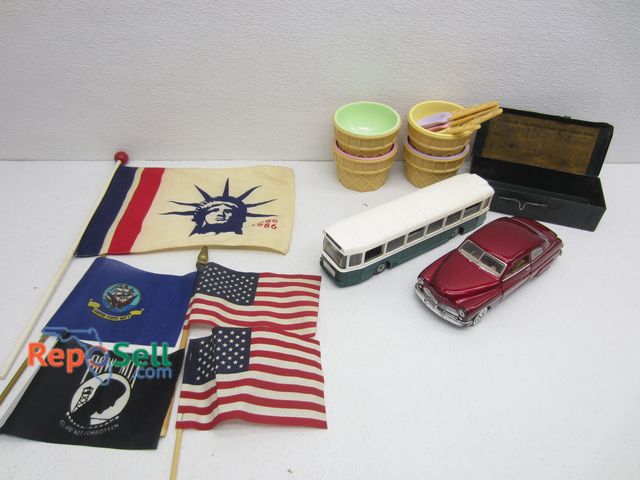 Lot 31-3209 - Estate Lot: Flags, Norev Autobus, 1949 Mercury, Metal Box, etc.