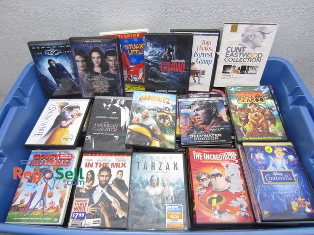 Lot 31-1204 - Large Tote of DVDs: Tangled, Forest Gump, Tarzan, Green Lantern, etc.