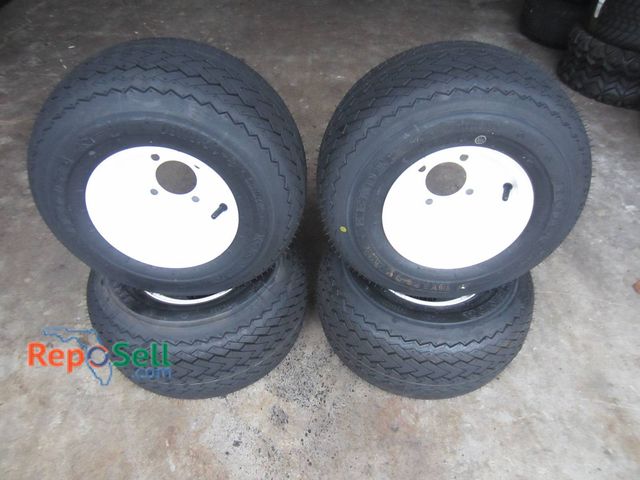 Lot 31-1272 - (4) New Kenda Tires With 8" White Steel Rims, Size 18x8.50-8, 4-Ply Rating