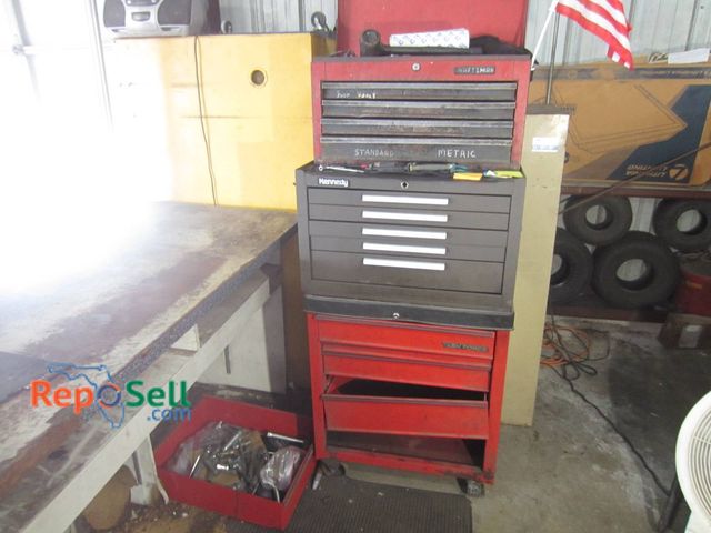 Lot 31-1298 - A Red Craftsman Tool Chest And A Kennedy Grey Tool Chest. Both Feature Multiple Drawers Containing V...