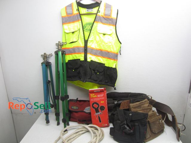 Lot 31-2425 - Tool Accessory Lot: Crown Safety Vest XL, Tool Belts, Band Clamp, (2) Tri-pod Sprinklers, etc.