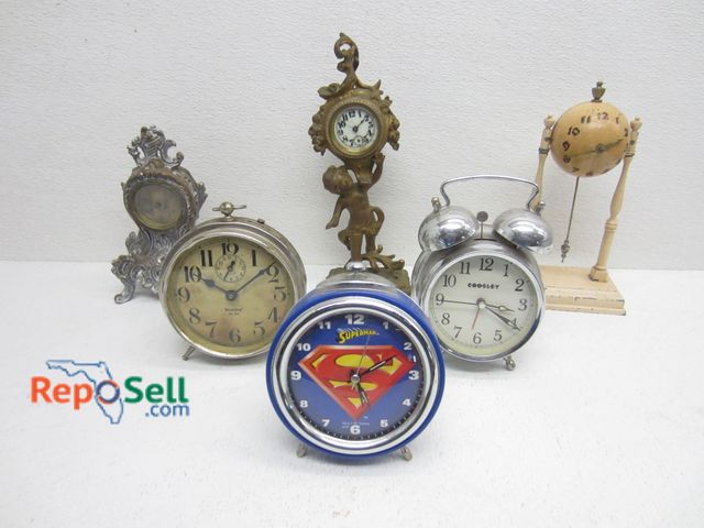Lot 31-9155 - (6) Small Clocks For Repair: Metal, Superman etc