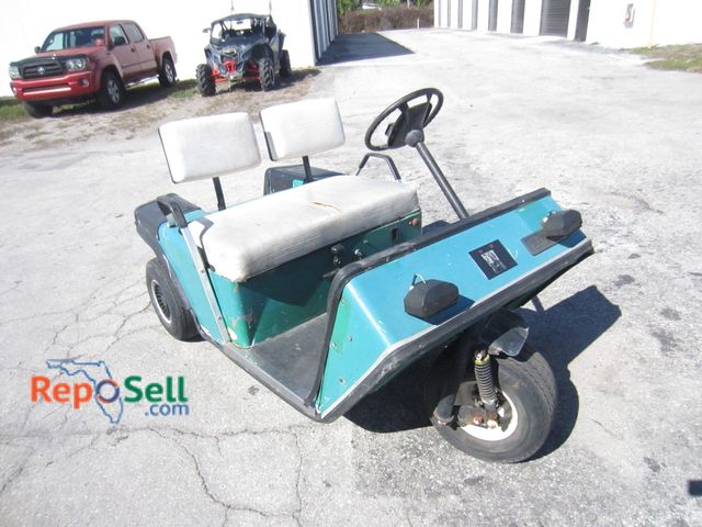 Lot 31-6362 - EZGO 3 Wheel Golf Cart With Charger, Ran Forward/Reverse When Tested, Needs (2) Batteries Replaced