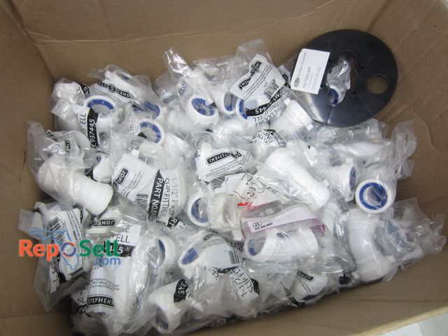 Lot 31-4130 - Large Lot of Plumbing Supply: 1 1/2" PVC Double Slip Fitting, Elbows, 2" Quik Tee, etc.