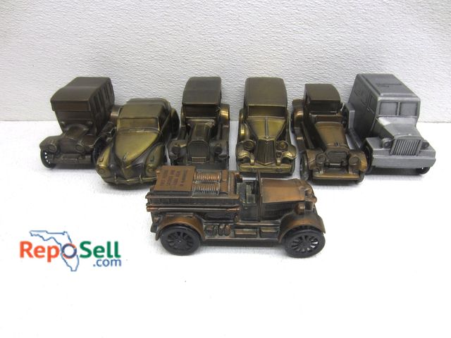 Lot 31-8326 - (8) 1970s Automotive Metal Banks