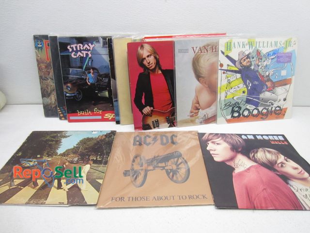 Lot 31-6314 - (23) Vintage Vinyl Records: Beatles Abbey Road, AC/DC, Hank Williams, Van Halen etc