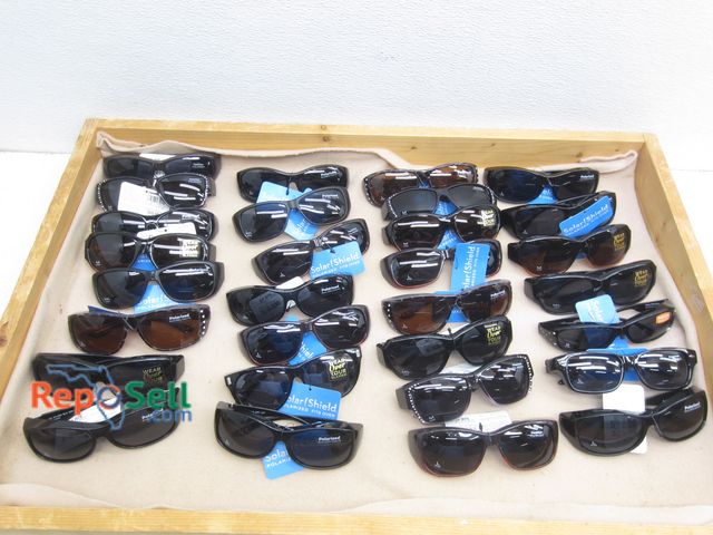 Lot 31-5431 - (30) New Foster Grant NWT Solar Shield Polarized Sunglasses w/ Large Wood Display - Fits Over Regula...