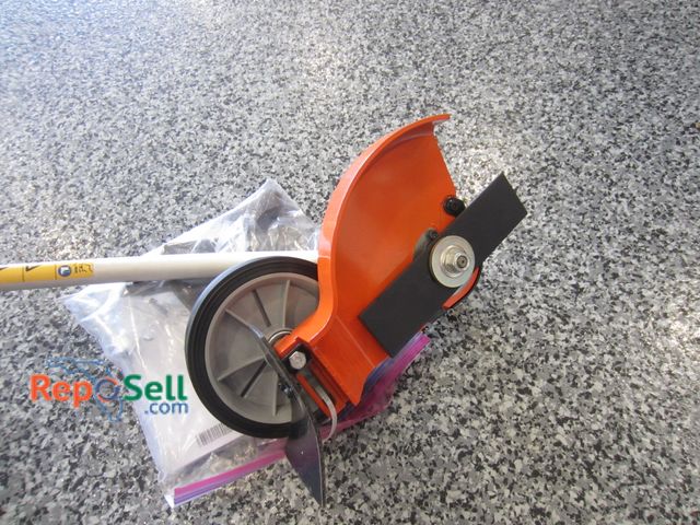 Lot 31-1070 - Husqvarna new edger head attachment only
