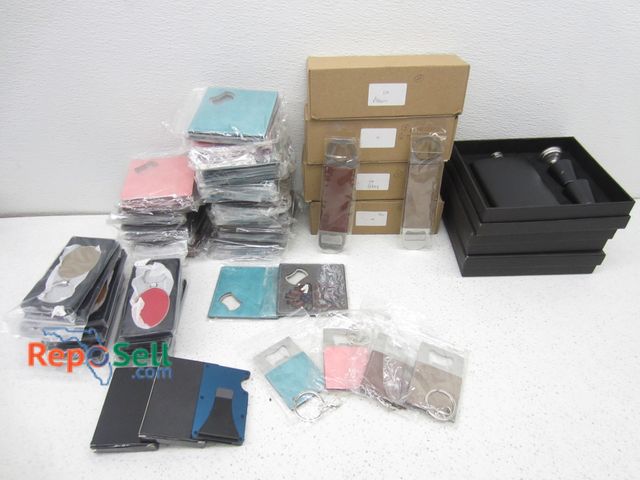 Lot 31-1082 - Lot of Flasks and Bottle Openers: metal/leather, RFID wallets, etc. - appear new.