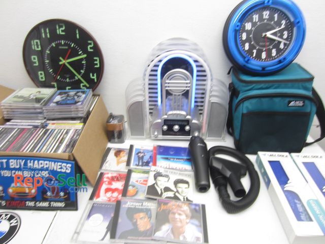 Lot 31-1259 - Estate Lot: Marilyn Stereo, Clocks, CD's, Cooler, Signs, etc.