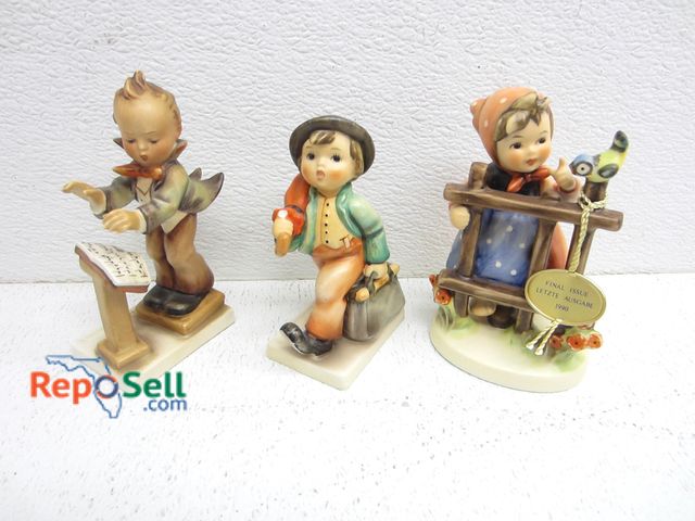 Lot 31-2444 - (3) Goebel Figures: Little Conductor, Merry Wanderer And Signs Of Spring, All West Germany