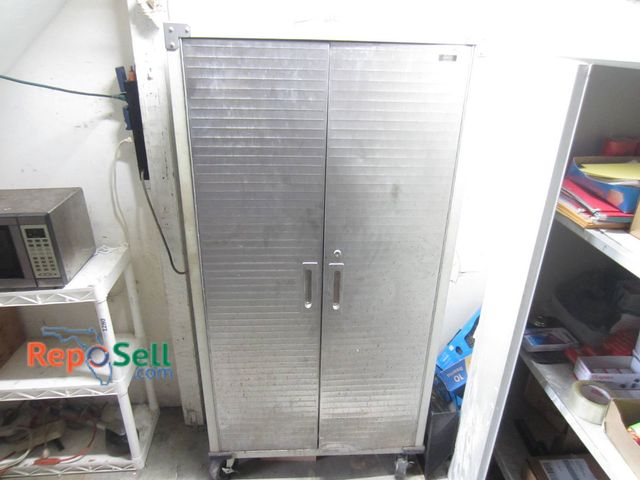 Lot 31-1281 - Stainless Steel Storage Cabinet (NO Contents)* Pick up Thurs* on Casters, 72"H x 36"W x 18.5"D, No C...
