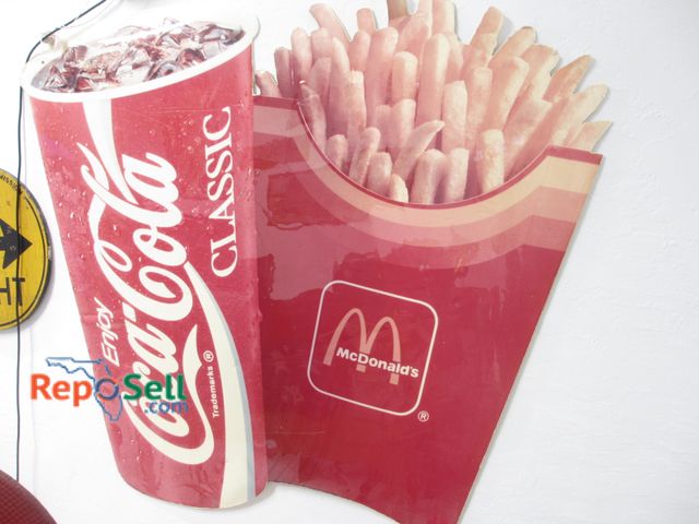 Lot 31-1123 - Large McDonalds &amp; Coca-Cola Foam and Cardboard Promo Sign; 48"h x 45"w; Bring Tools to remove