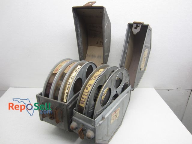 Lot 31-8556 - (5) Vintage 35 MM Reels 1971 Run The Wild River In (2) Metal Cases