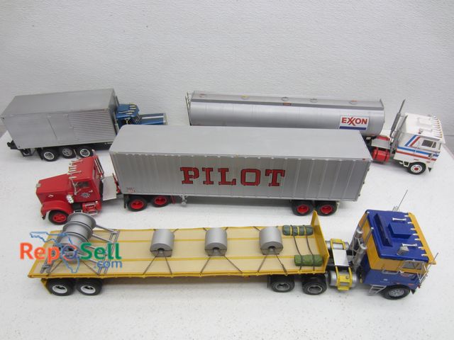 Lot 31-9236 - (3) Assorted Truck Cabs and Trailers and One Truck 1:24 Scale