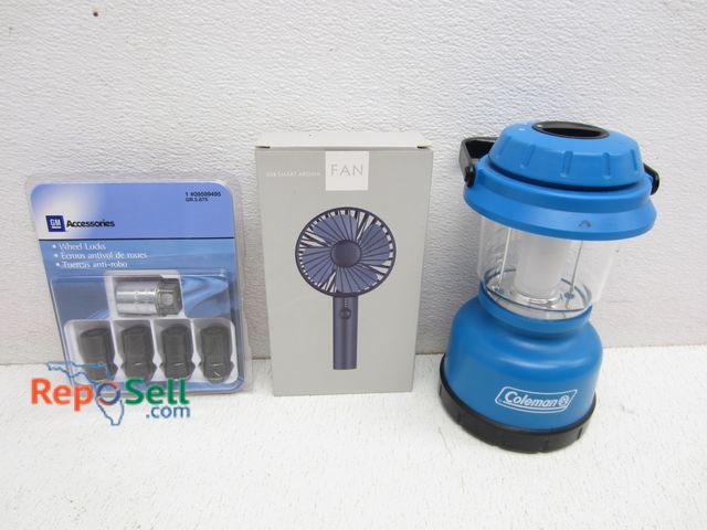 Lot 31-5176 - Estate Lot: Coleman Light, Aroma Fan (appears unused), GM Cadillac Wheel Locks