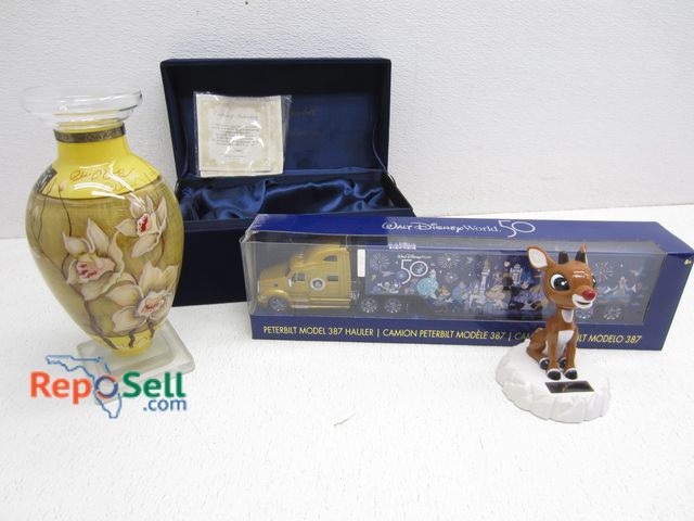 Lot 31-5174 - Estate Lot: Art Vase w/COA, Disney Peterbilt #387 and Rudolph