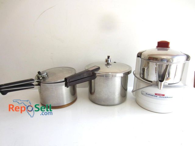 Lot 31-9183 - A stainless steel Revere Ware pressure cooker with a Bakelite handle, a lidded stainless steel pot, ...