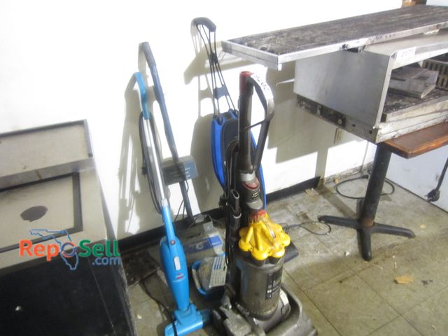 Lot 31-2076 - (3) Assorted Vacuum Cleaners, etc.: Oreok &amp; Dyson Power On, Carpet Cleaner, etc.