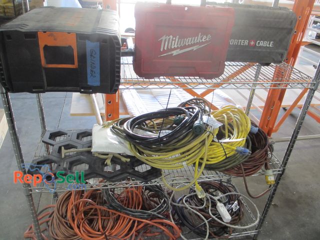 Lot 31-8322 - Contents of Rack: Extension Cords, (3) Empty Tool Boxes, etc. - Rack Not Included