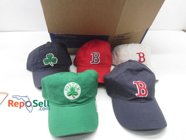 Lot 31-8130 - (99) Mixed Style Boston Celtics &amp; Red Sox Caps - New w/Tags