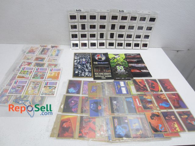 Lot 31-9343 - (40) NBA 35mm Slides: Chicago Bulls, NY Knicks, Jordan, Pippen, etc. &amp; Aladin Cards