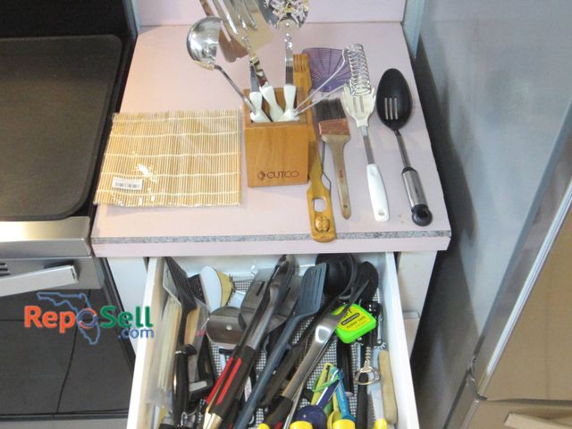 Lot 31-8668 - Large Kitchen Utensil Lot Including Stainless and Plastic Tools