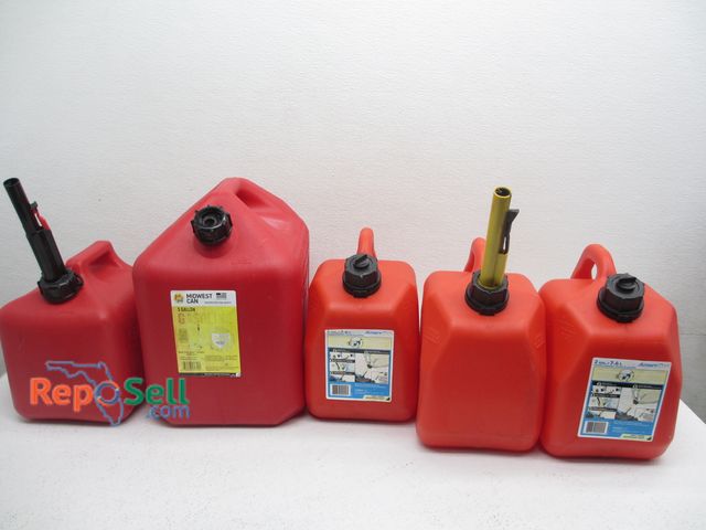 Lot 31-3186 - (4) 2 Gal Gas Cans, (1) 5 Gal with Tote