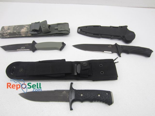 Lot 31-9078 - (3) Gerber Fixed Blade Knives With Sheaths: Watson Harsey Silver Trident, Jax, Larson, Harsey, Reeve