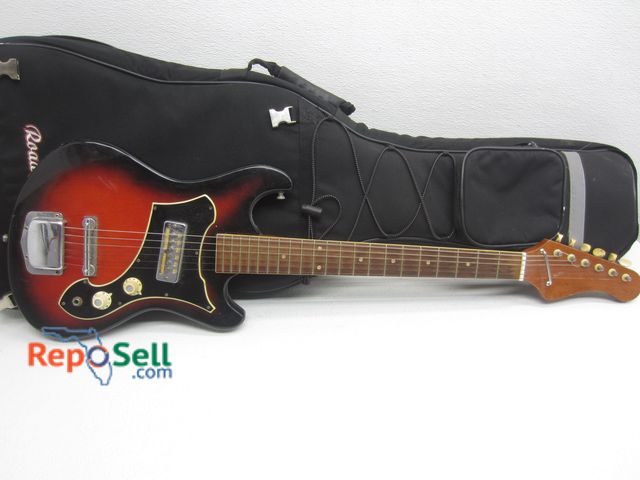 Lot 31-7237 - Teisco Electric Guitar w/Case