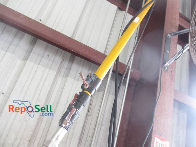 Lot 31-1334 - Pressure Washer Extension Featuring A Long Yellow Handle And Metal Connections. Designed For High-Pr...
