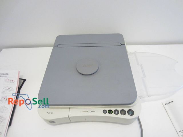 Lot 31-9050 - Canon PC170 Copier, 120V, Includes Cover, Instruction Manual, And Additional Accessories. Powers On