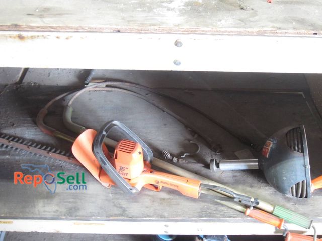 Lot 31-1283 - Black & Decker 16-Inch Electric Hedge Trimmer With Orange Housing And Steel Cutting Blades And (3) H...