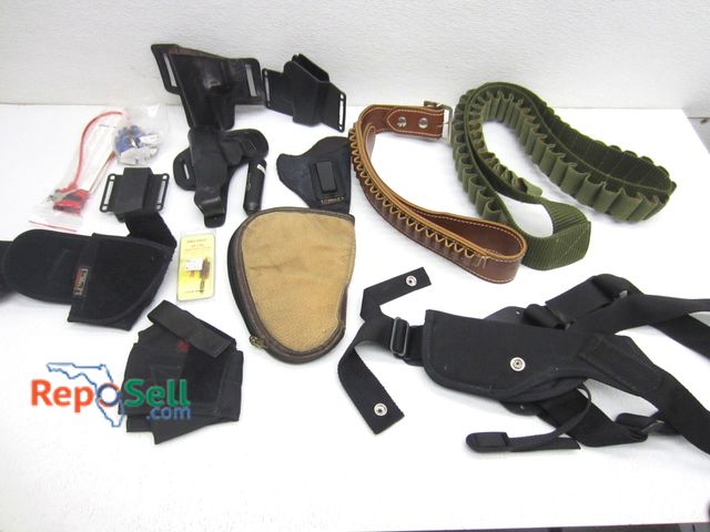 Lot 31-5439 - Lot of Assorted Holsters &amp; (2) Ammunition Belts
