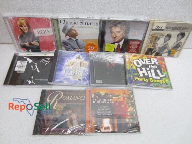 Lot 31-6449 - Lot of New CDs: Xmas Albums, Reba, Rod Stewart, etc.