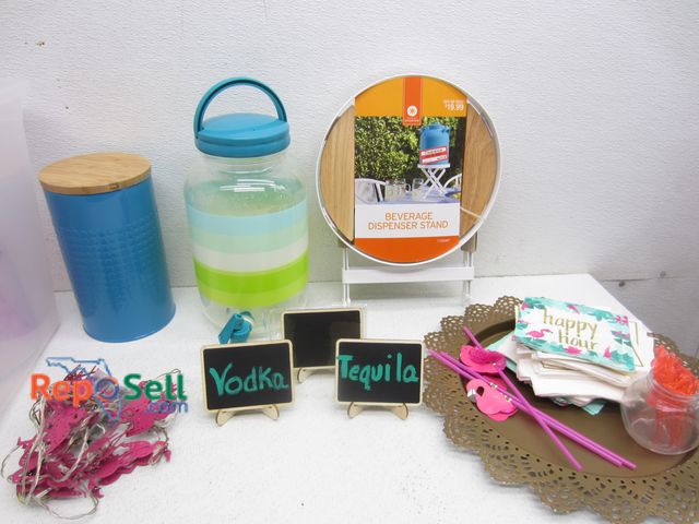 Lot 31-4235 - Party Décor Lot: Beverage Dispenser Stand, Drink Signs/Stands, Napkins, Flamingo Lights, etc. - Tote...